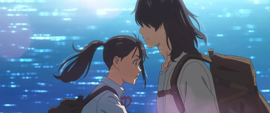 Suzume and Souta stand together beside sunlit blue water.
