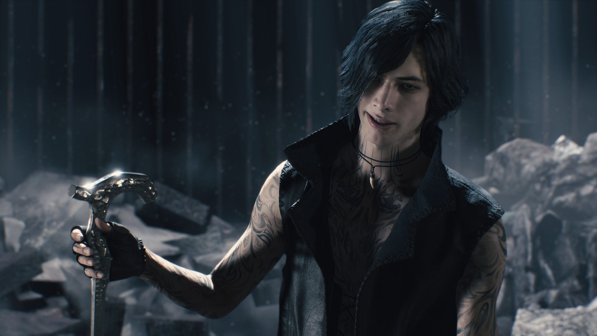 A close view of V holding a cane in a dark, snowy scene.