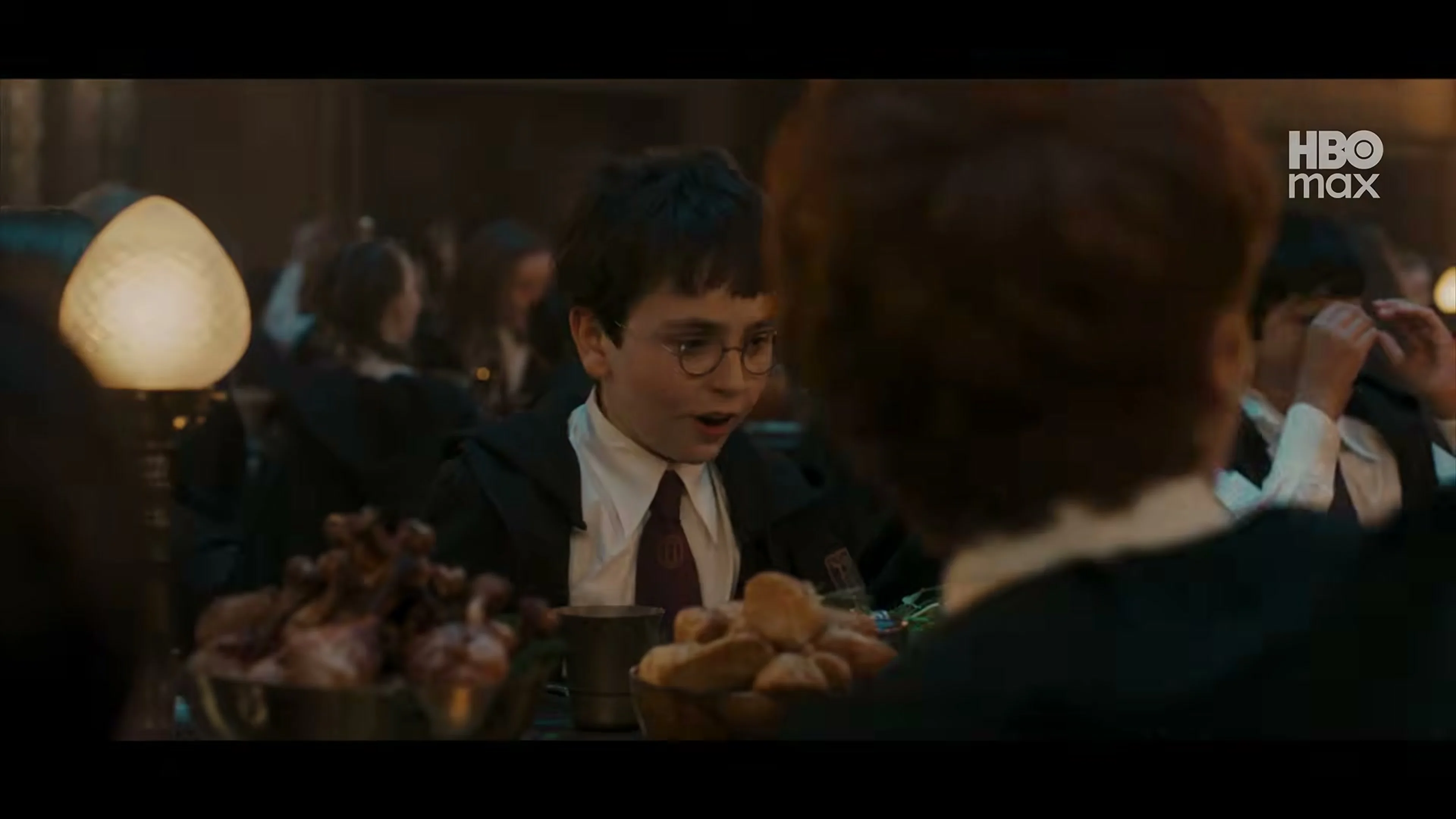 Students sit at the tables in Hogwarts’ Great Hall in HBO’s Harry Potter series.