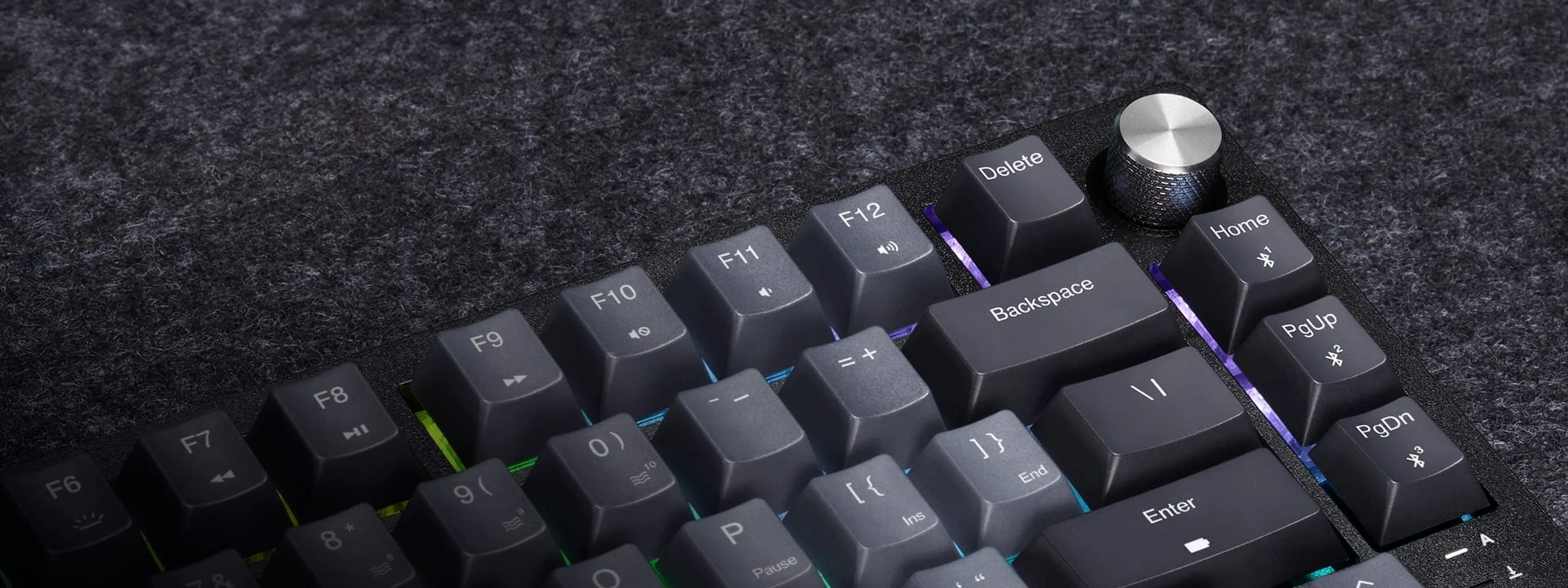 K65 Plus volume dial beside the function keys and navigation keys