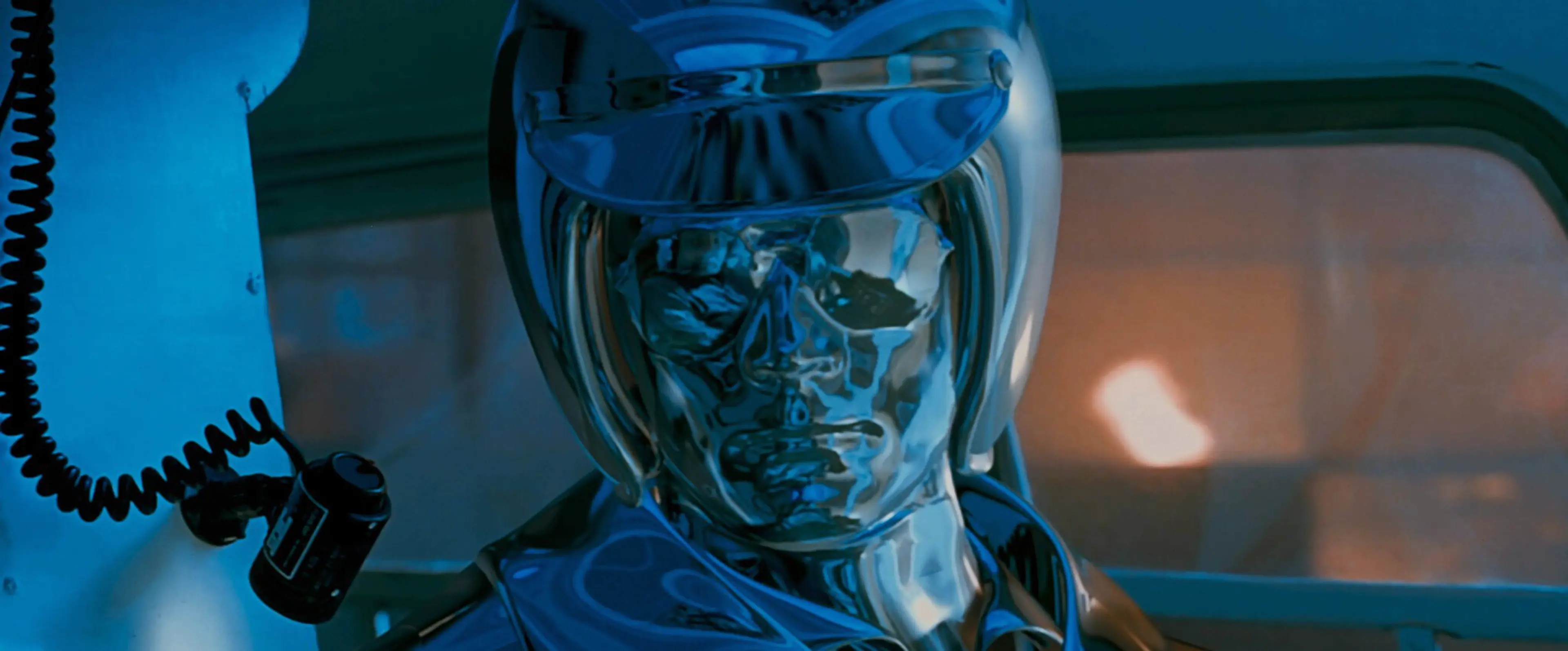 The T-1000’s chrome face reflects the cockpit inside a police helicopter in Terminator 2: Judgment Day.