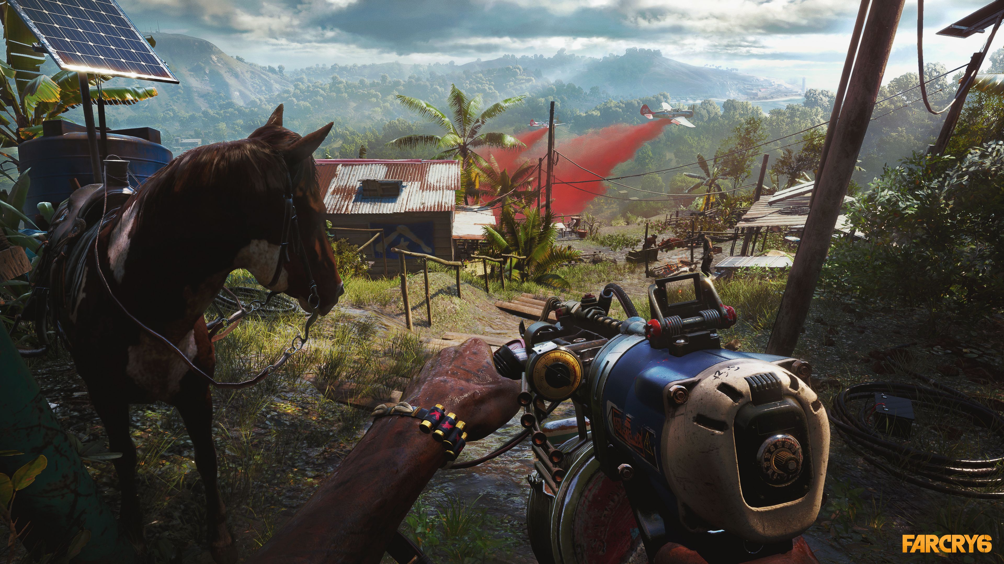 A player with a homemade weapon looks over a tropical settlement beside a horse in Far Cry 6.