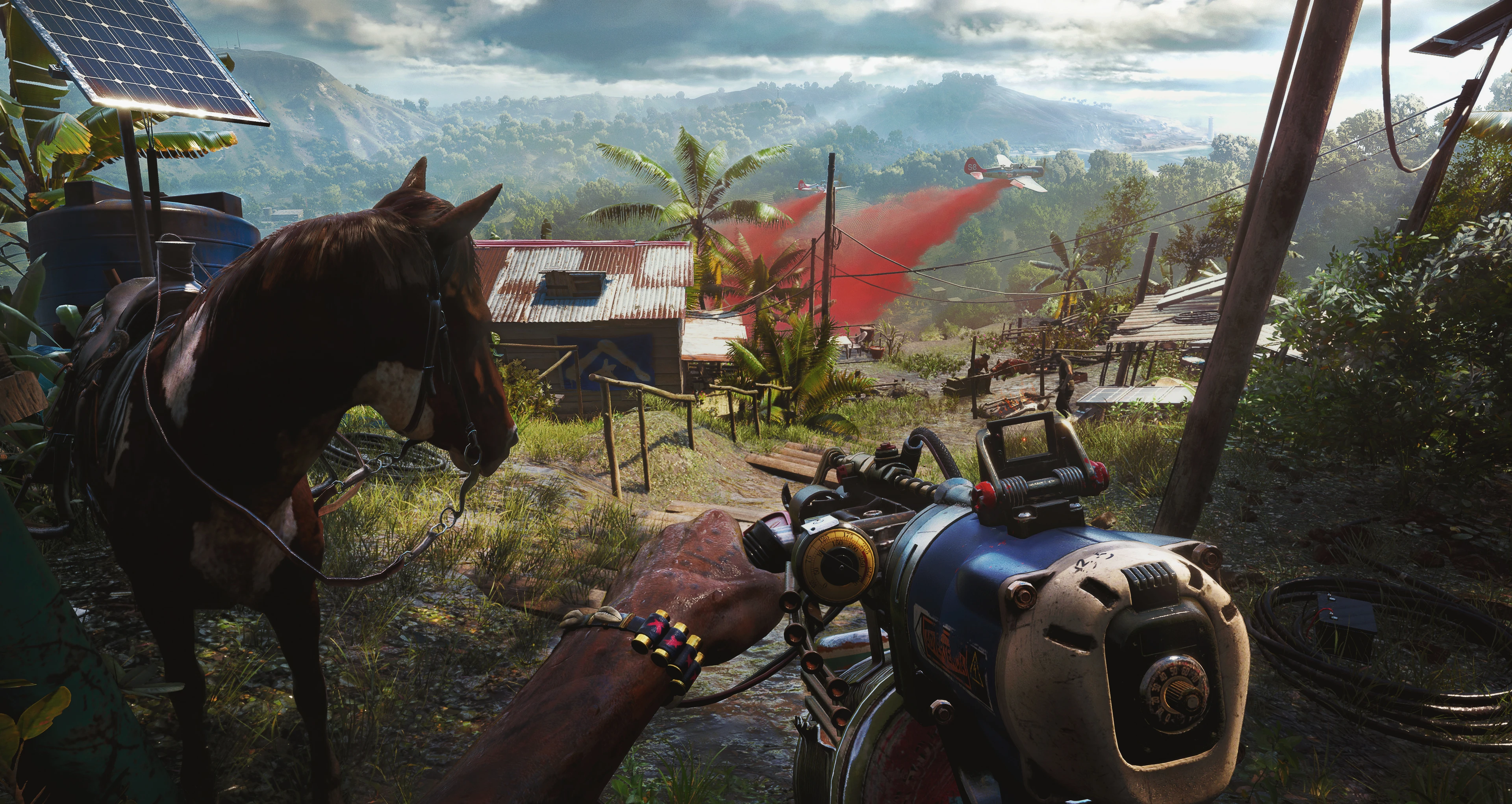 A player with a homemade weapon looks over a tropical settlement beside a horse in Far Cry 6.