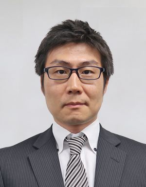 Nippon Ichi Software executive Kenzo Saruhashi poses for an official portrait.