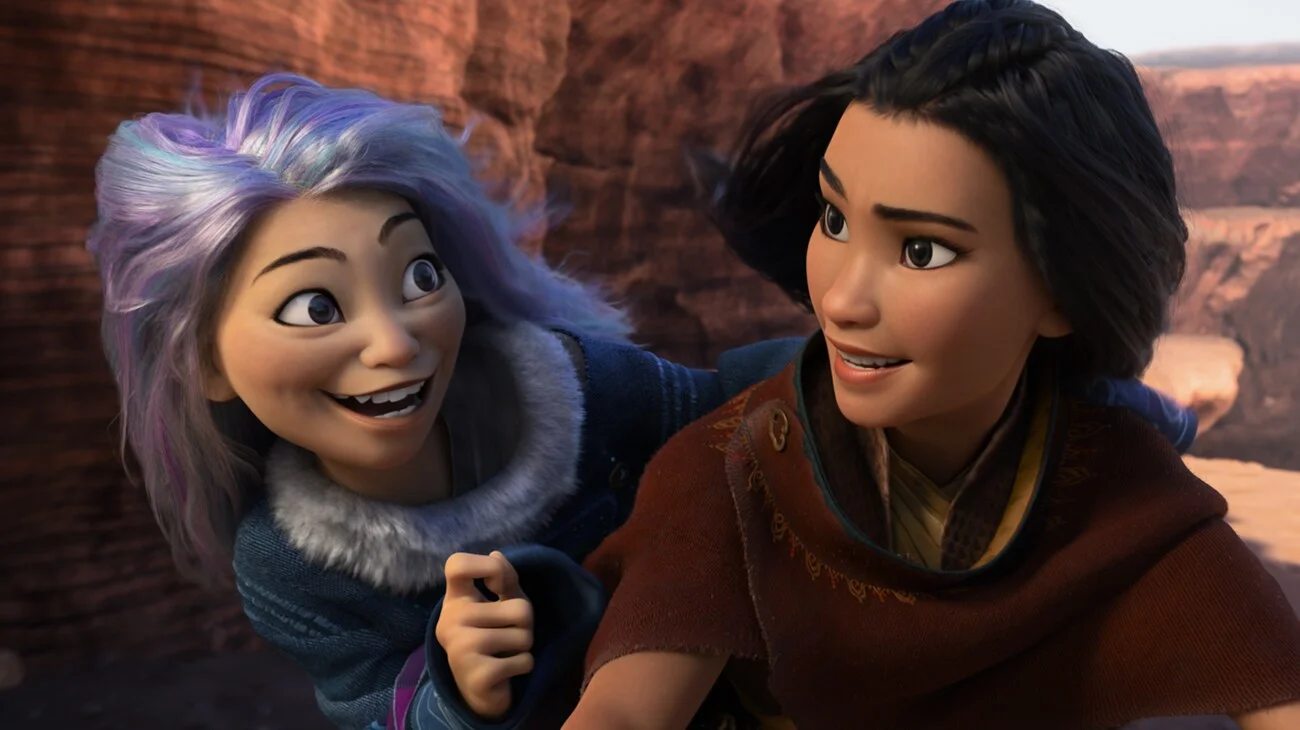 Raya sits beside Namaari in Raya and the Last Dragon