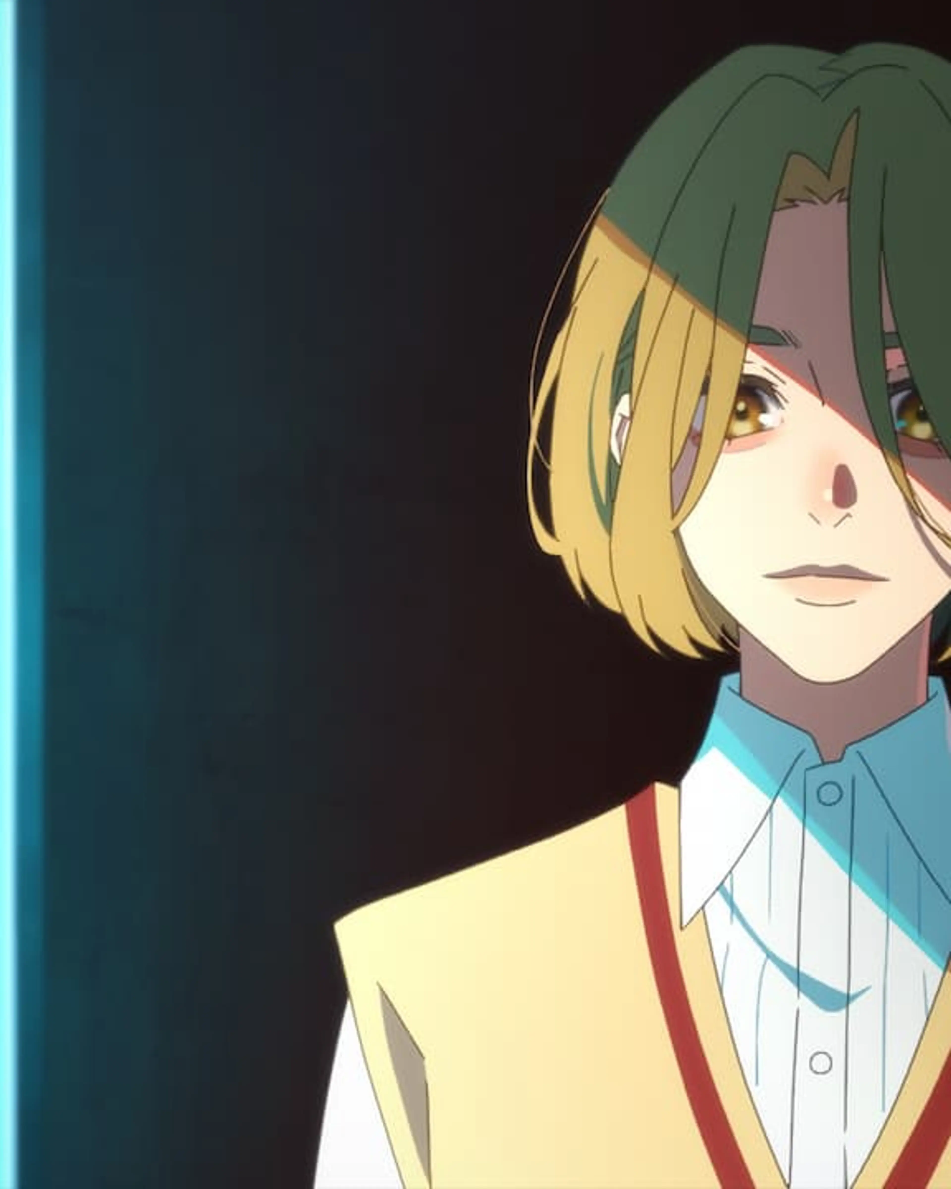 Aia appears in a shirt and tie in BLESS.