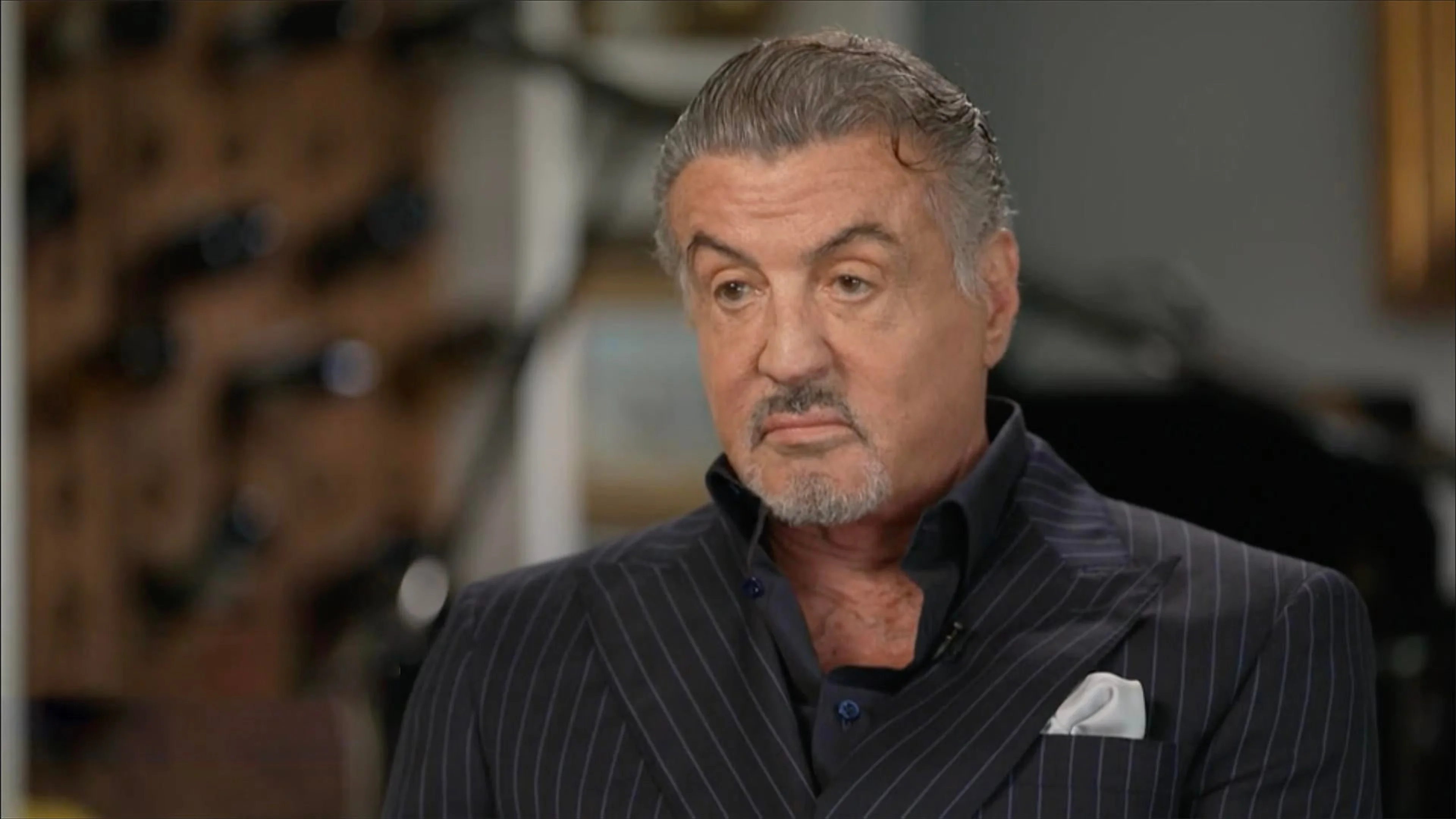 Sylvester Stallone speaks in a 2024 CBS interview about his television role in Tulsa King.