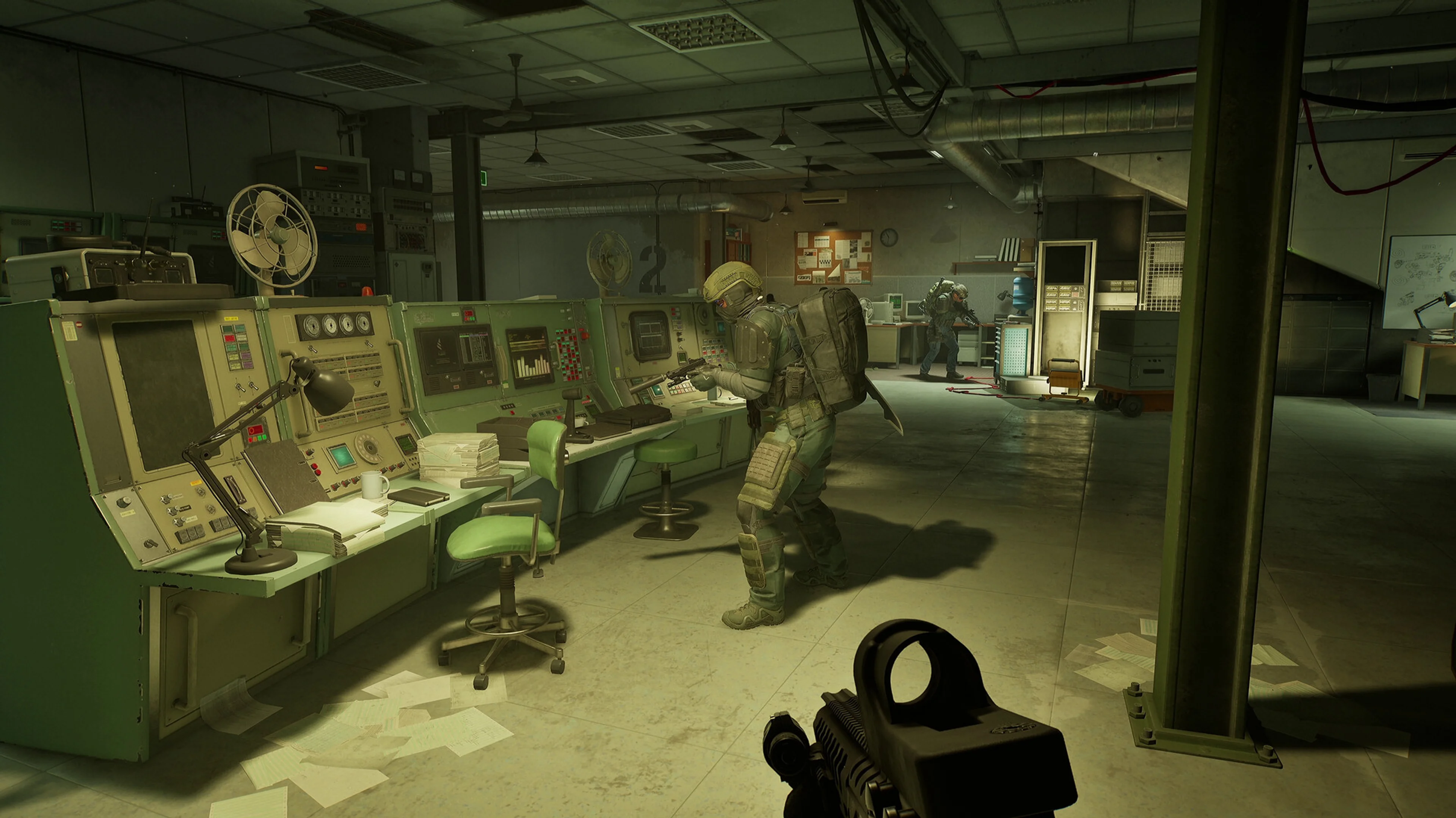 Armed squad members search a room filled with control panels in PUBG: Black Budget.