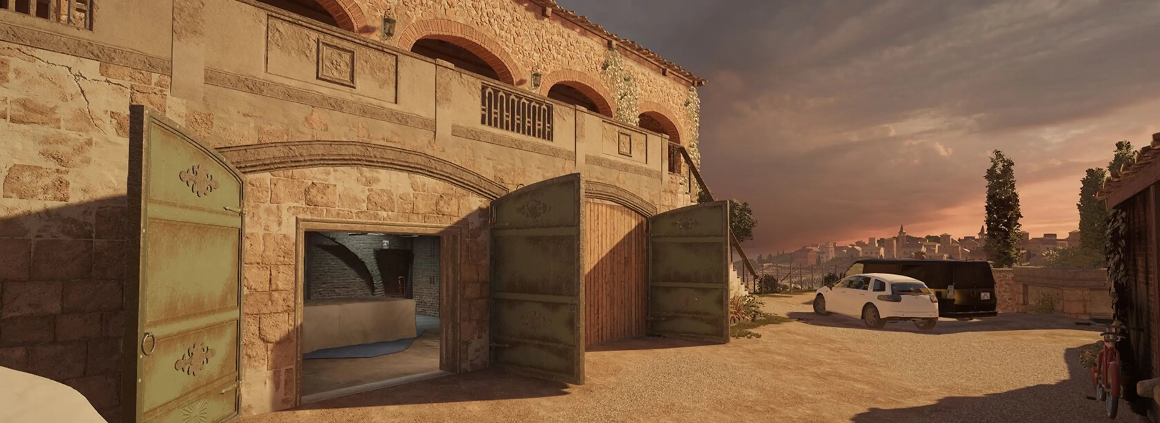 The exterior garage doors at Villa stand open at sunset in the Operation Split Fire map update.