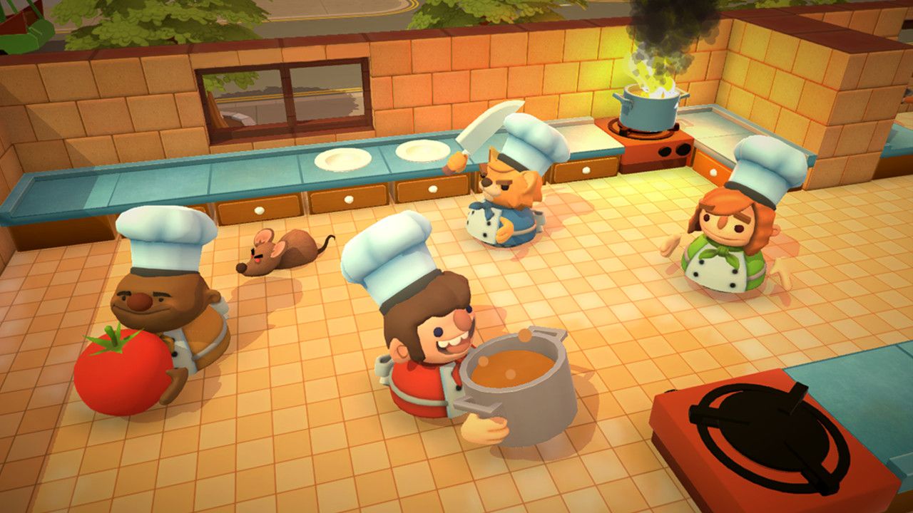 Several cartoon chefs prepare food around a large pot in a restaurant kitchen.