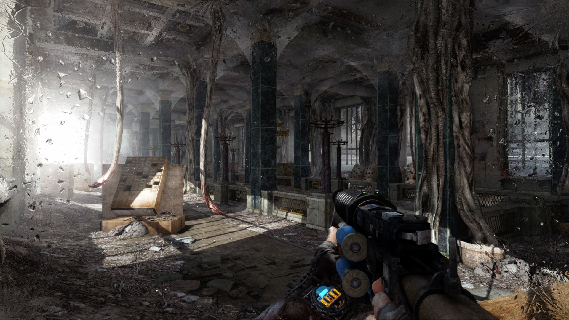 A first-person view through a ruined hall with tall columns in Metro 2033 Redux.