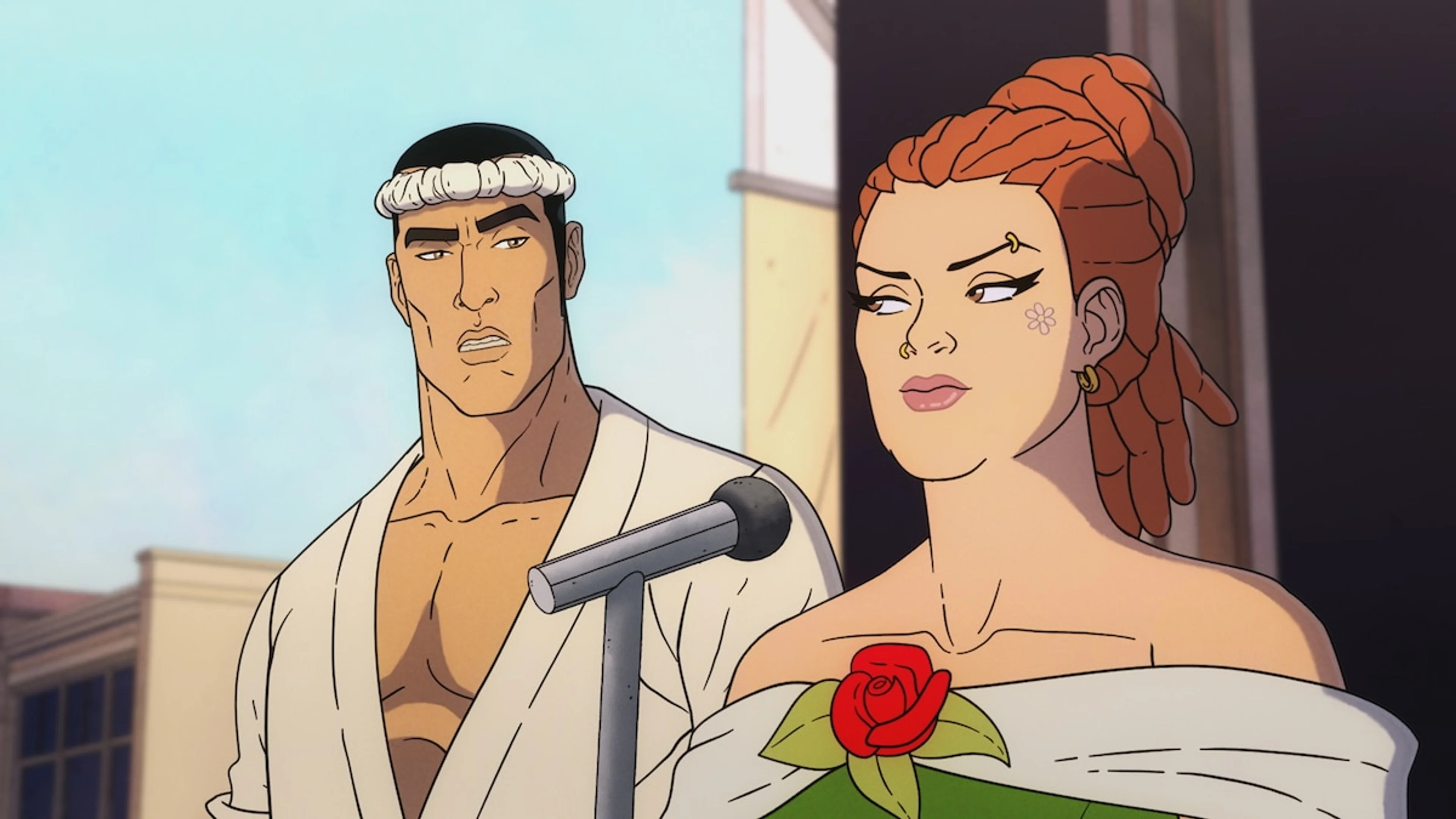 Jiro stands behind a red-haired woman holding a rose near a microphone.