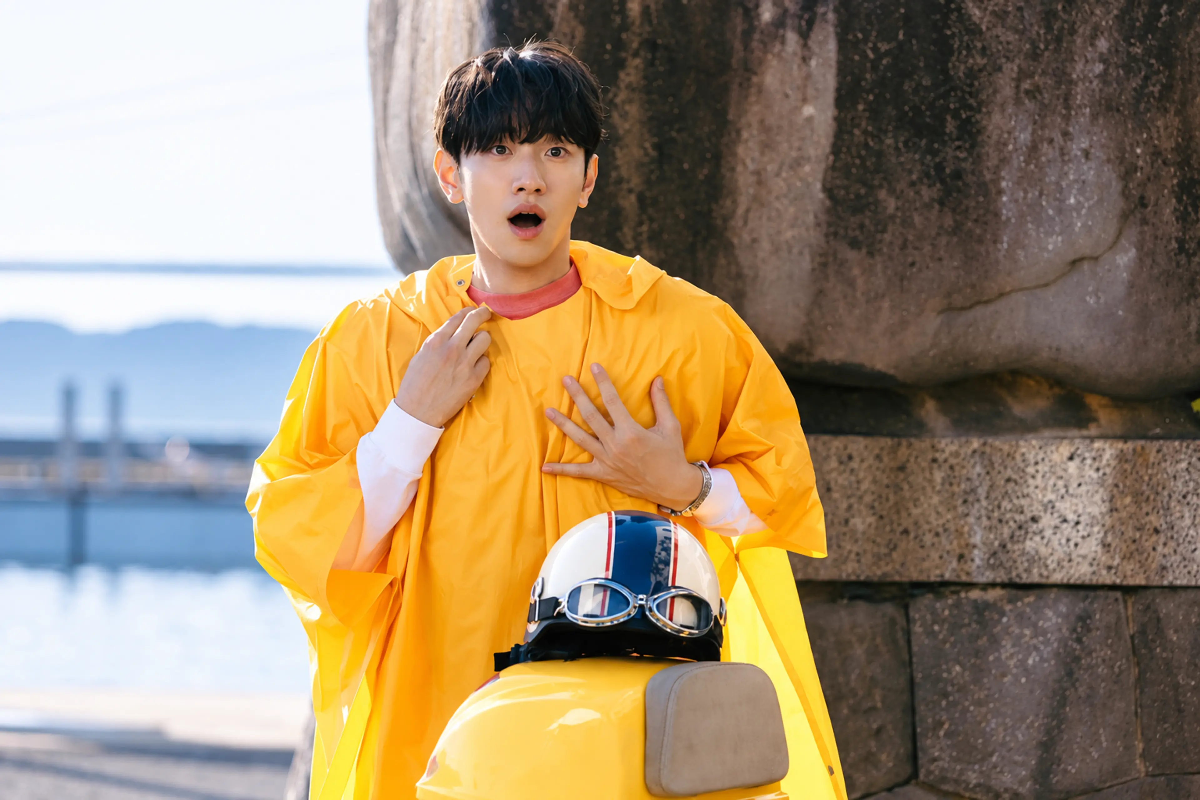 Nam Yoon-su as Park Kunam in a yellow shirt beside a scooter in Merry Berry Love.