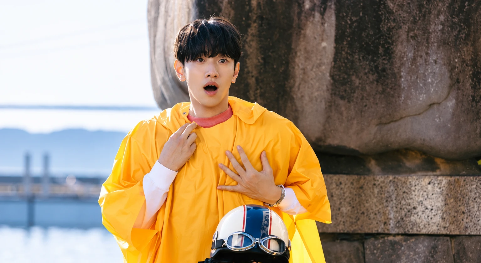Nam Yoon-su as Park Kunam in a yellow shirt beside a scooter in Merry Berry Love.