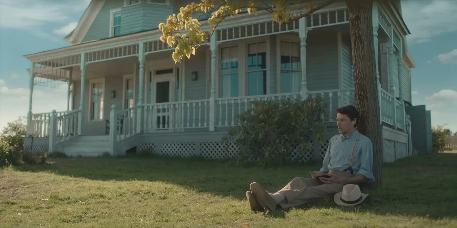 A son sits outside the Tyrone family home in Long Day’s Journey Into Night.