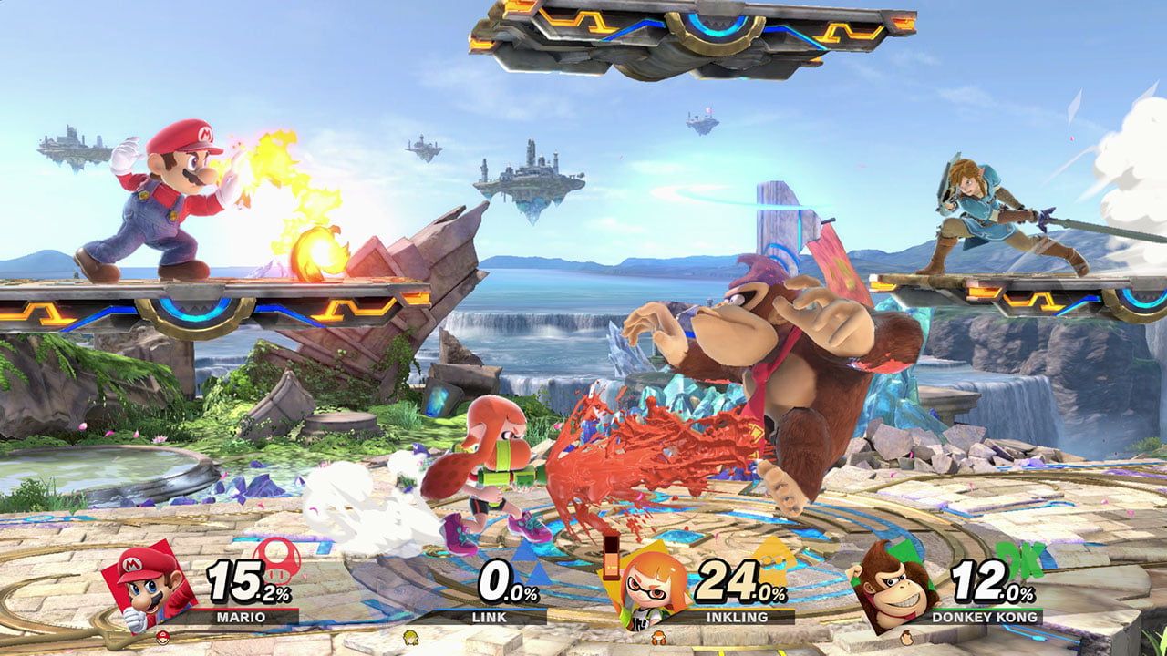 Mario, Donkey Kong, Link and Inkling fight on a platform stage with damage percentages along the bottom.