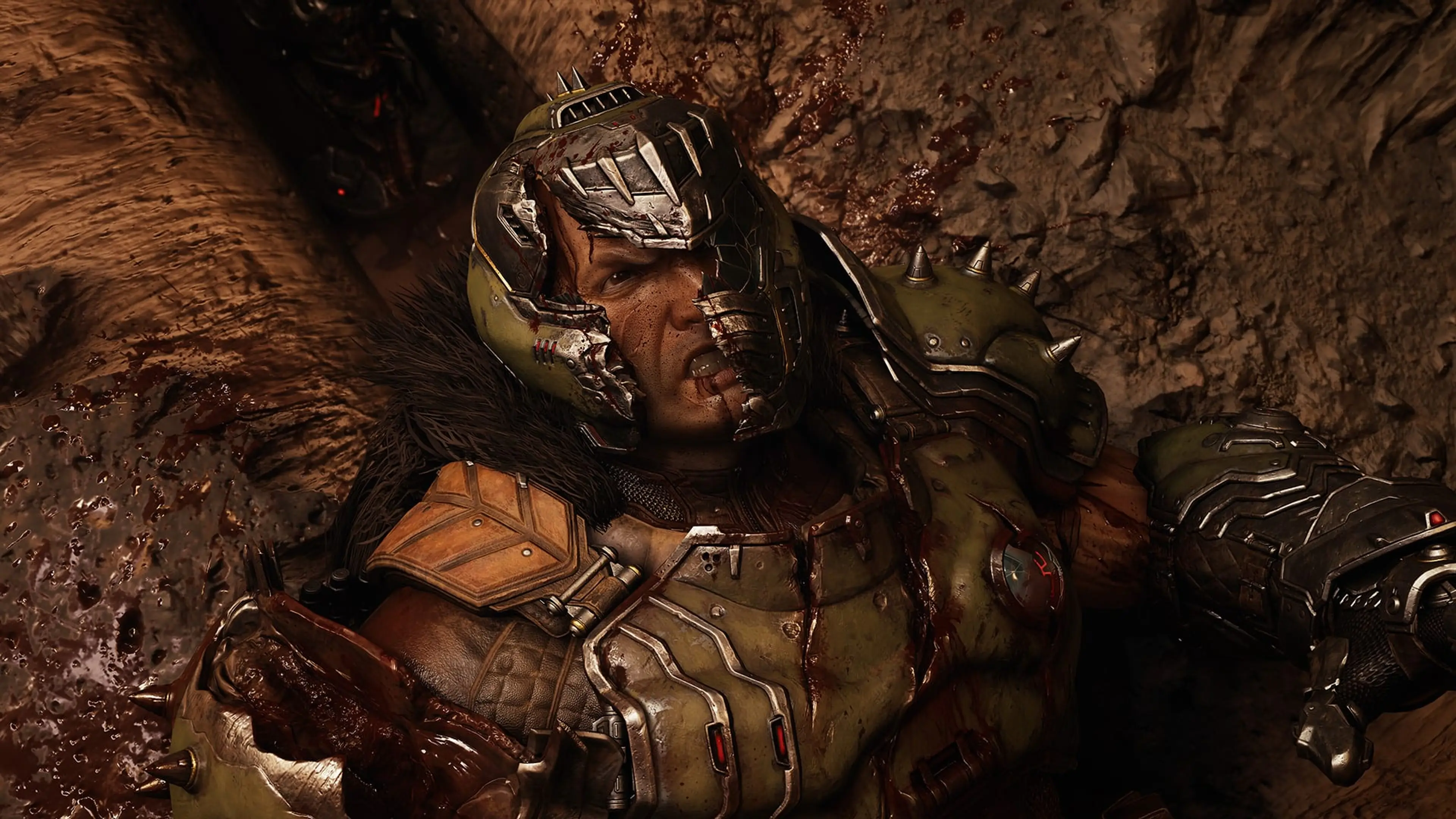 The Doom Slayer knocked down with his helmet visor destroyed in Revelations.
