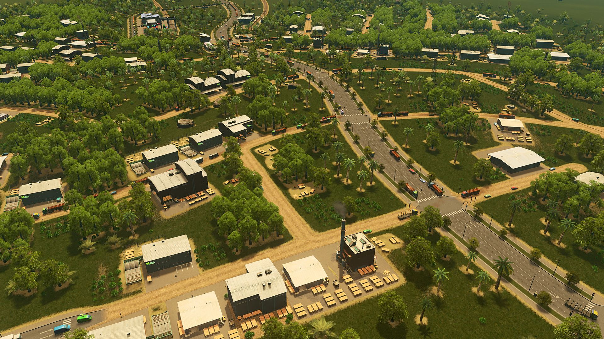 A green low-rise neighbourhood has curved roads and scattered houses.