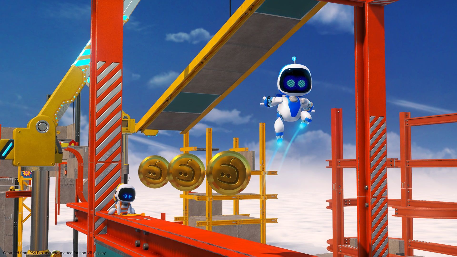 Astro crosses raised platforms and floating coins in a bright level.