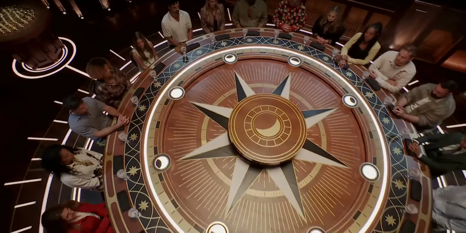 Contestants gather around the roundtable in The Traitors: New Blood.
