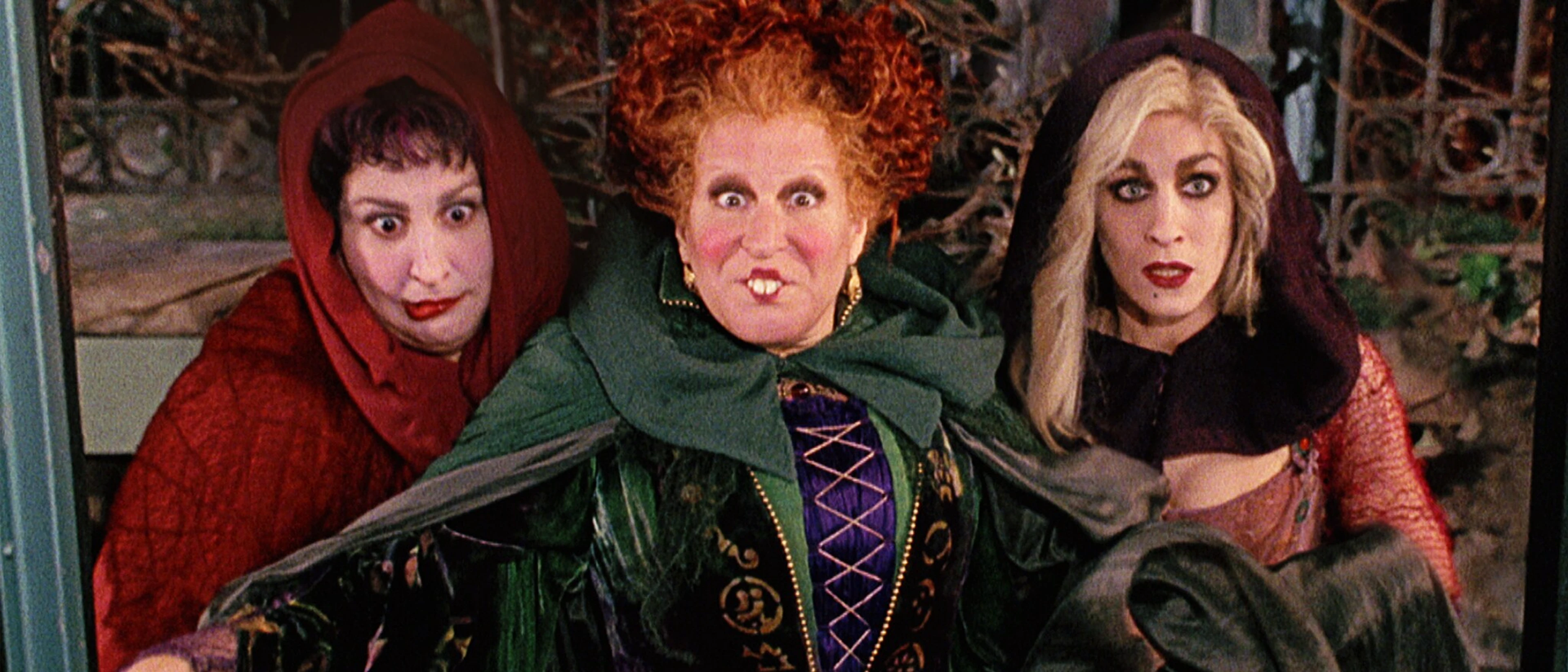 Kathy Najimy, Bette Midler and Sarah Jessica Parker as the Sanderson sisters in the 1993 Hocus Pocus.