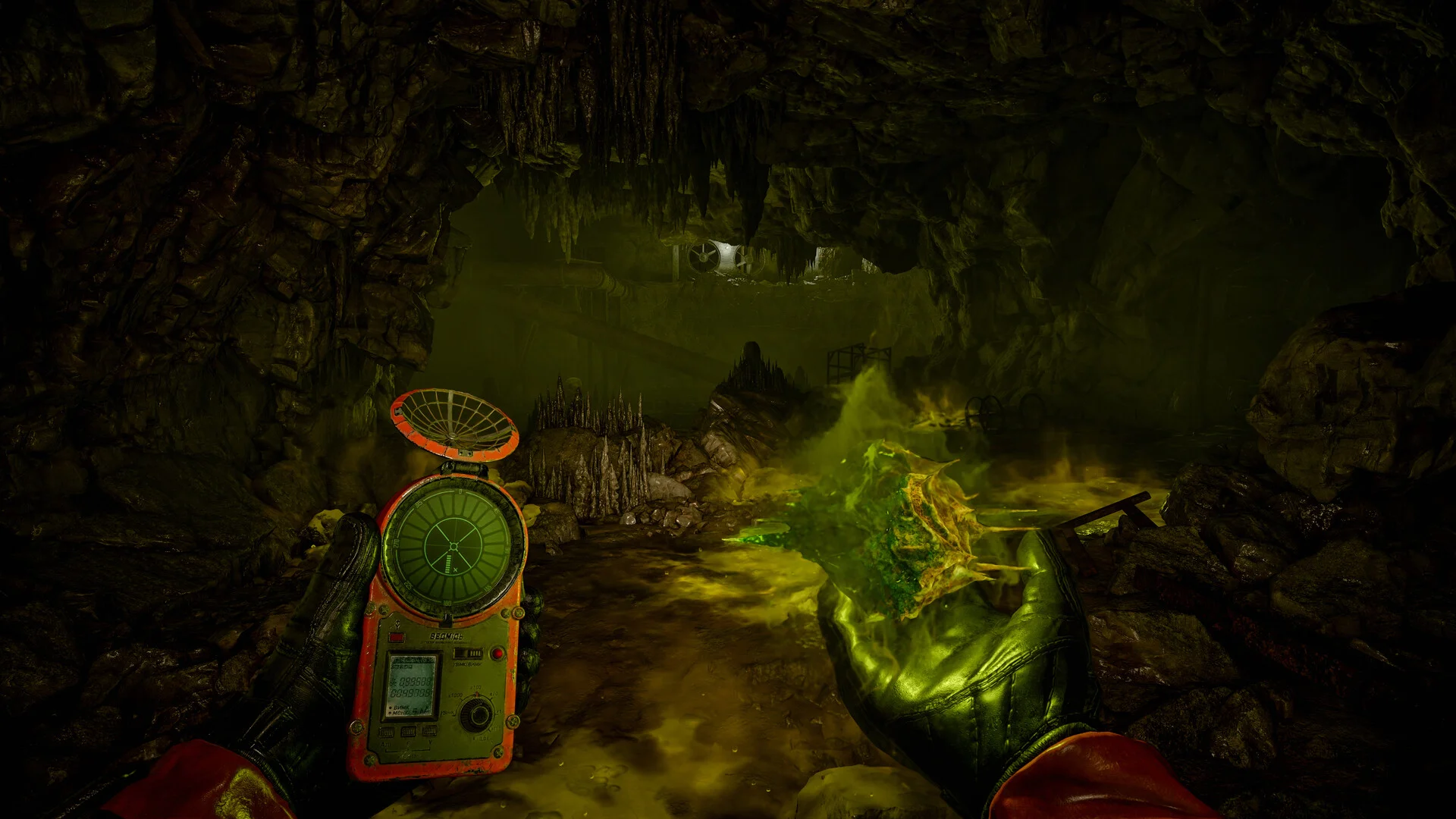 A stalker holding an artifact detector beside a glowing anomaly in a cave in S.T.A.L.K.E.R. 2.