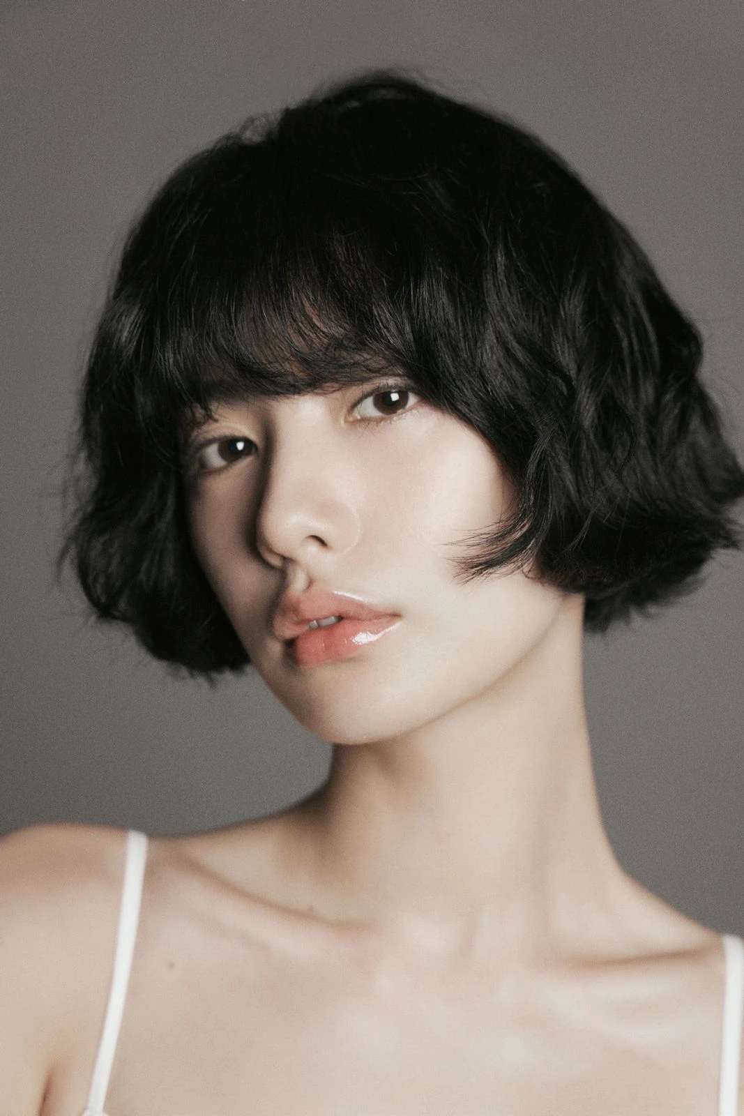 NANA in an official agency portrait.