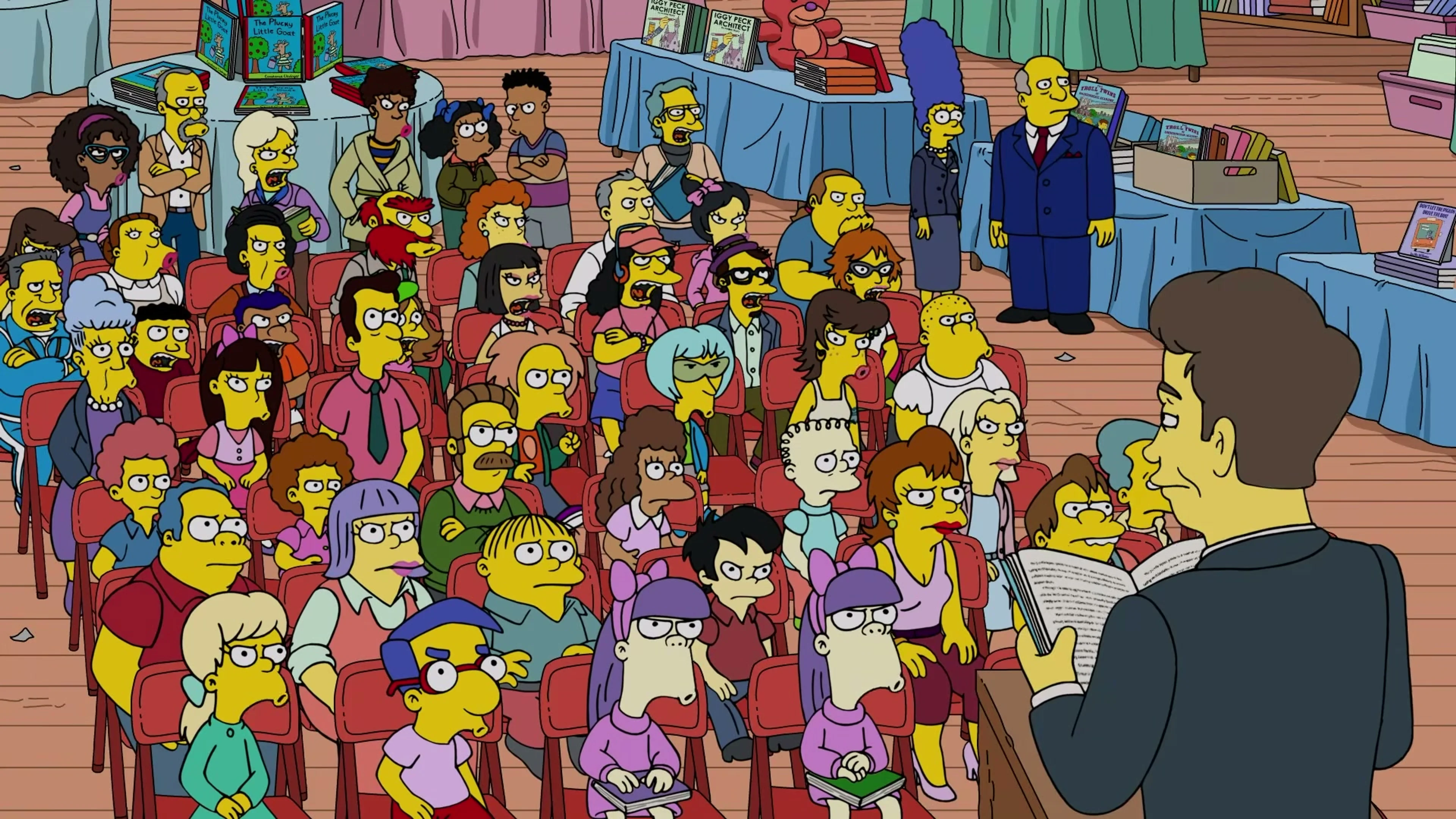 Springfield Elementary audience watches the book-fair presentation in The Simpsons.