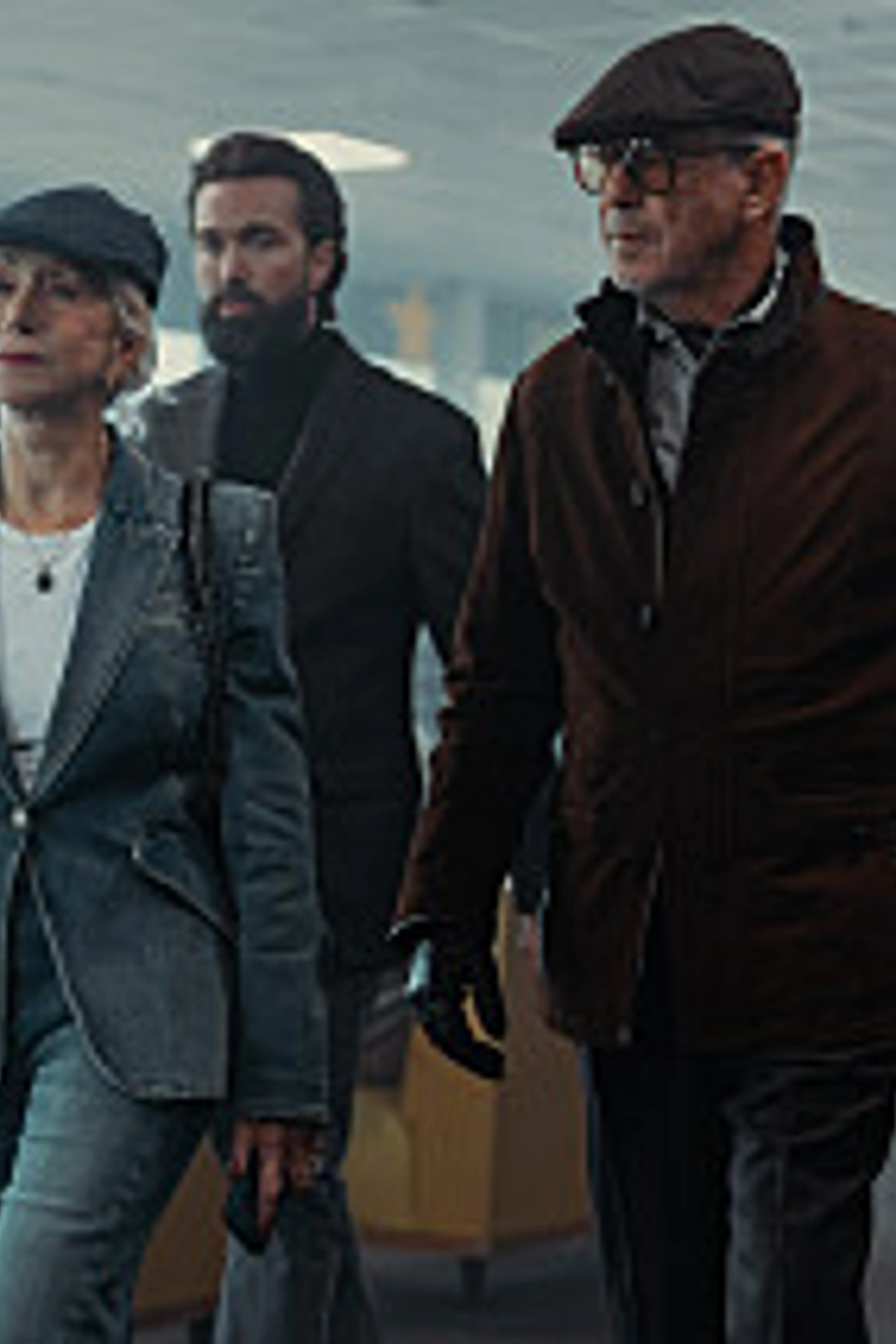 The MobLand ensemble walks through a bright interior in an official Season 2 still.