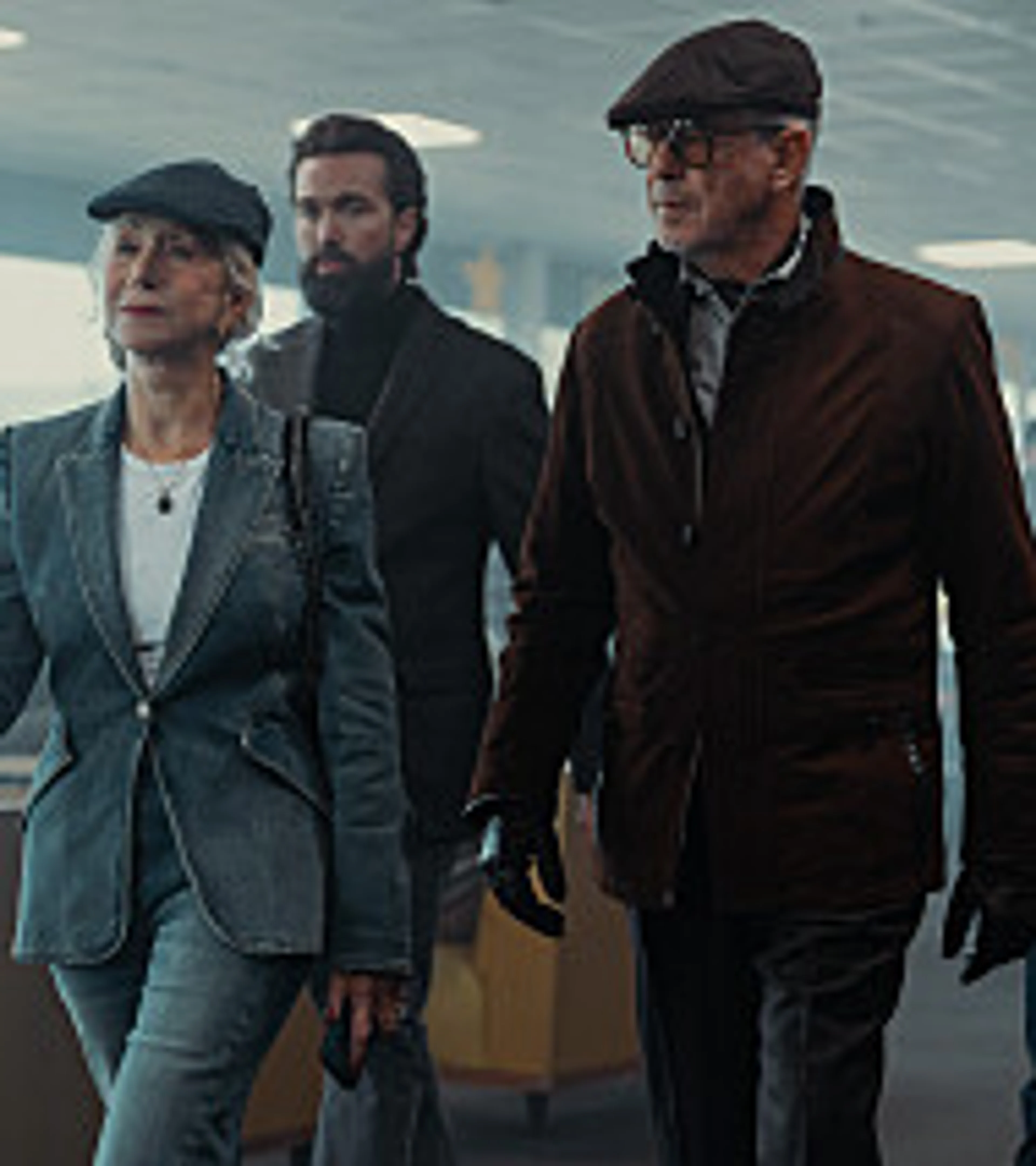 The MobLand ensemble walks through a bright interior in an official Season 2 still.