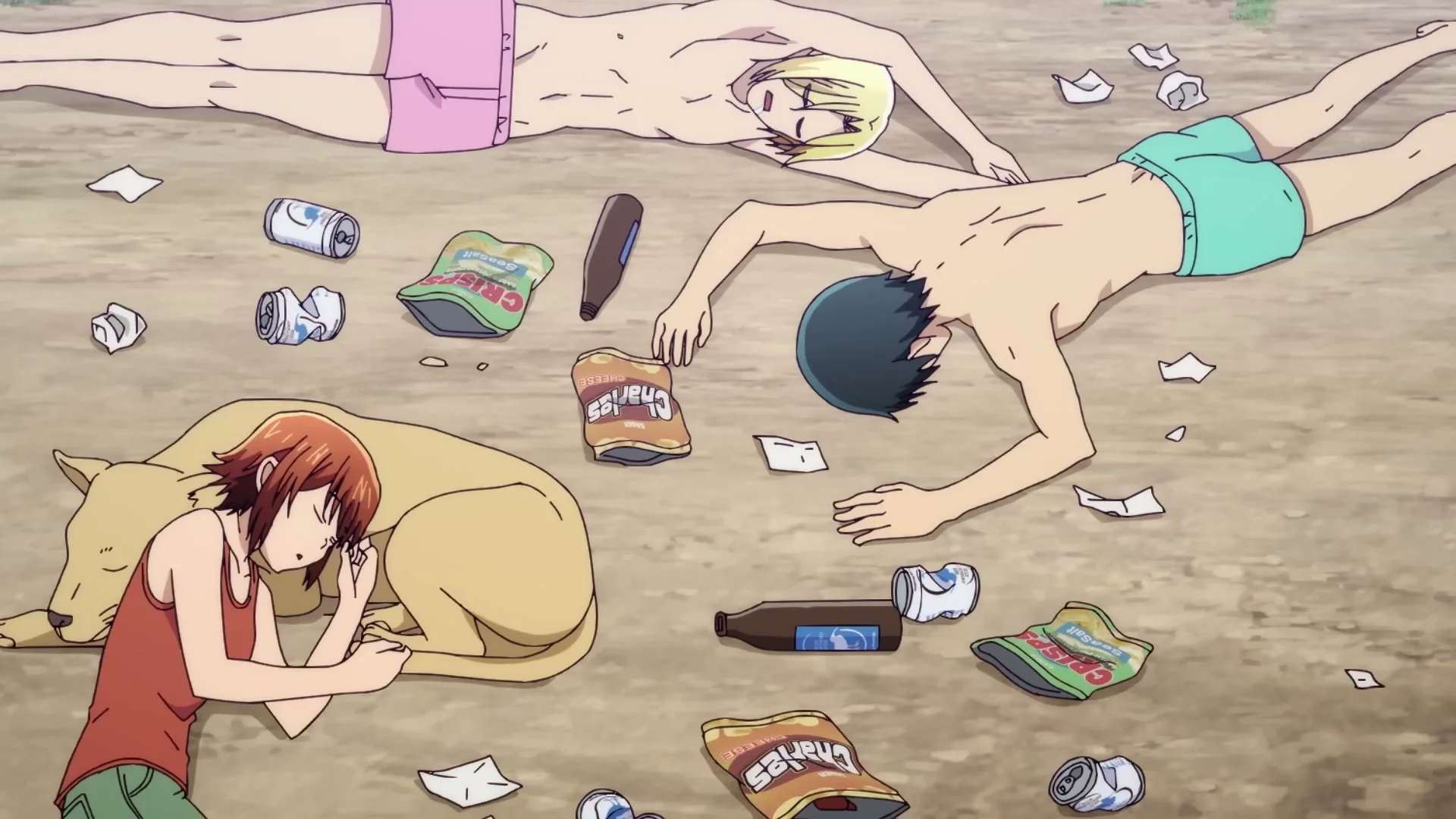 The Grand Blue Dreaming group lies exhausted on the beach.