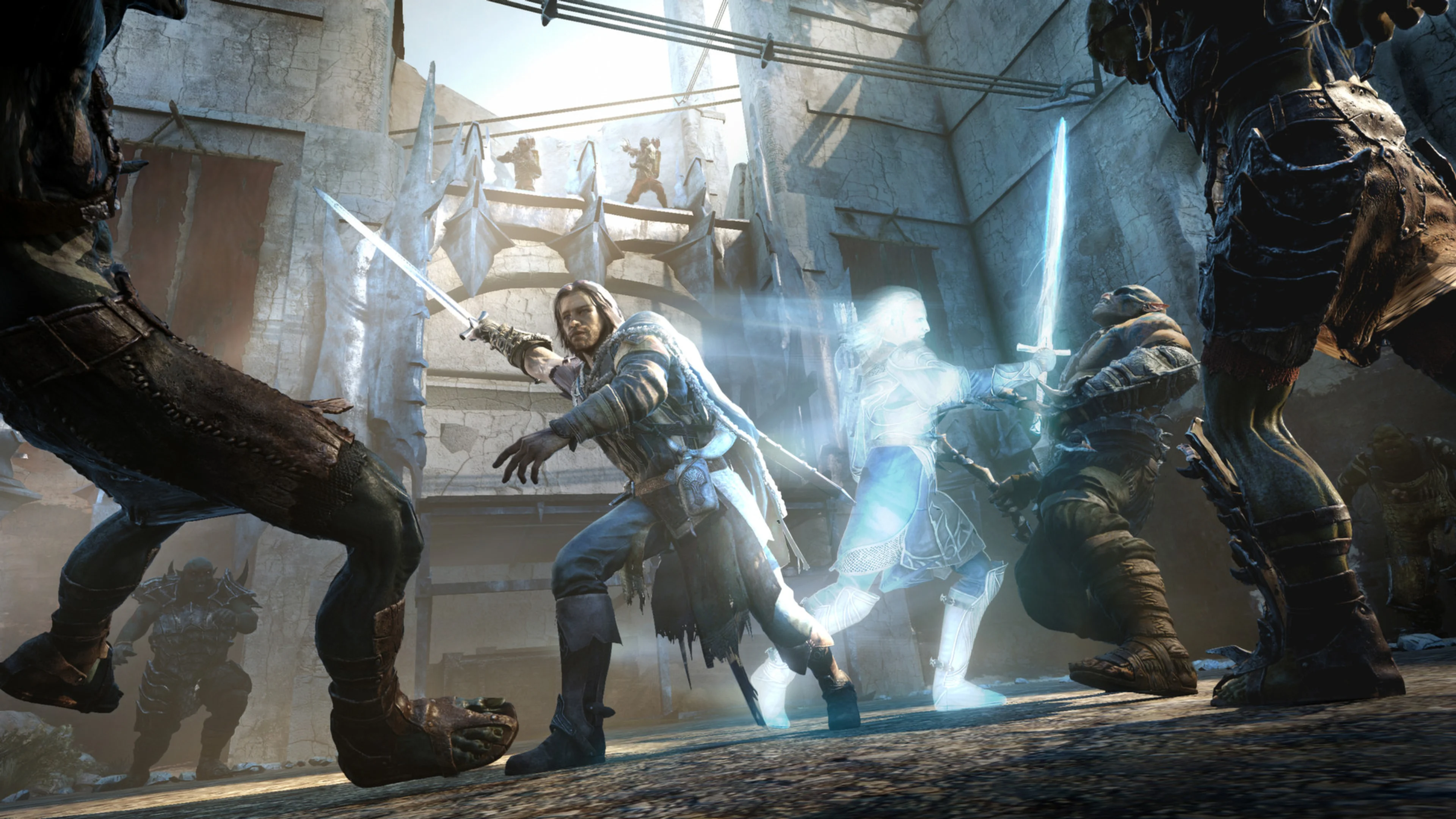 Talion fights orcs with the help of a glowing wraith in Shadow of Mordor.