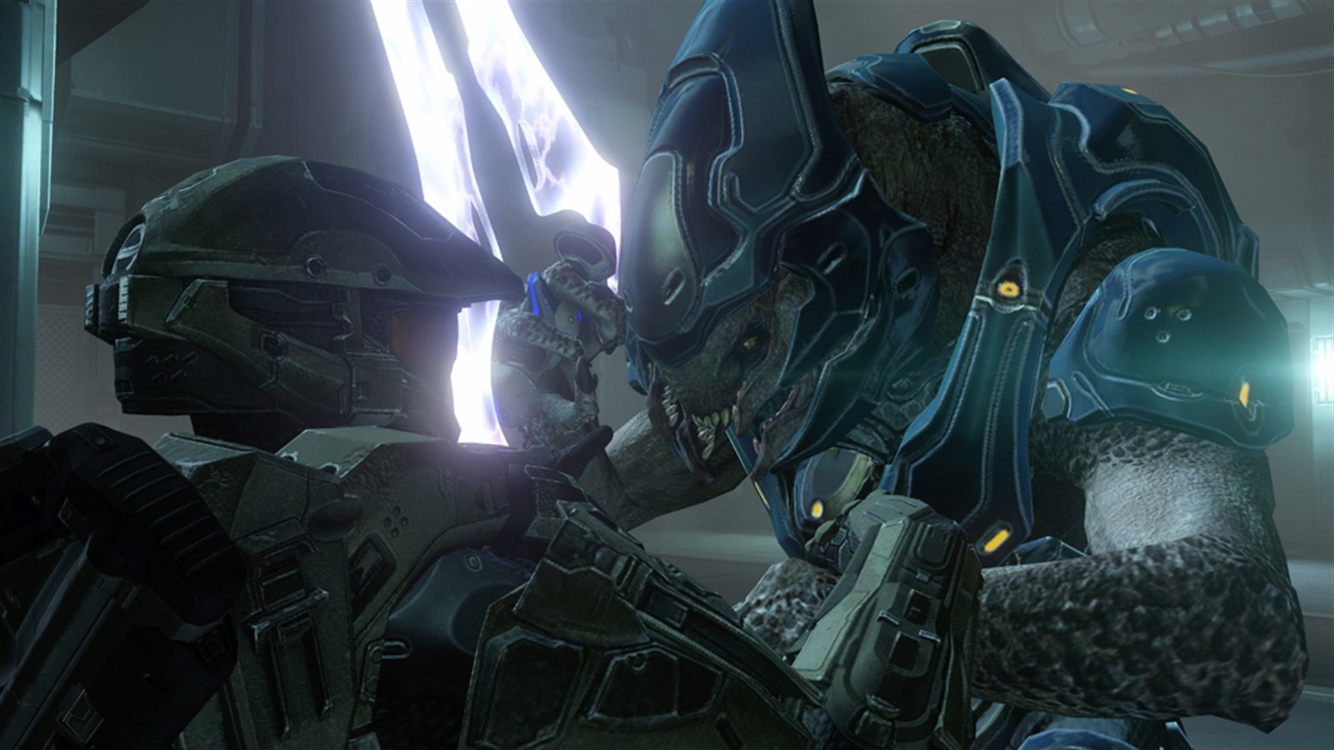 Master Chief faces a large armored alien at close range in Halo 4.