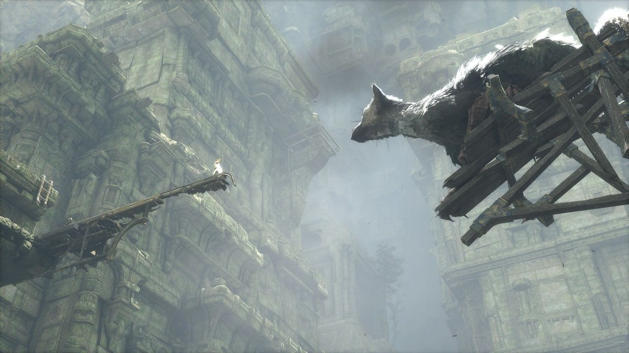 The boy and Trico on wooden platforms on opposite sides of a large gap.