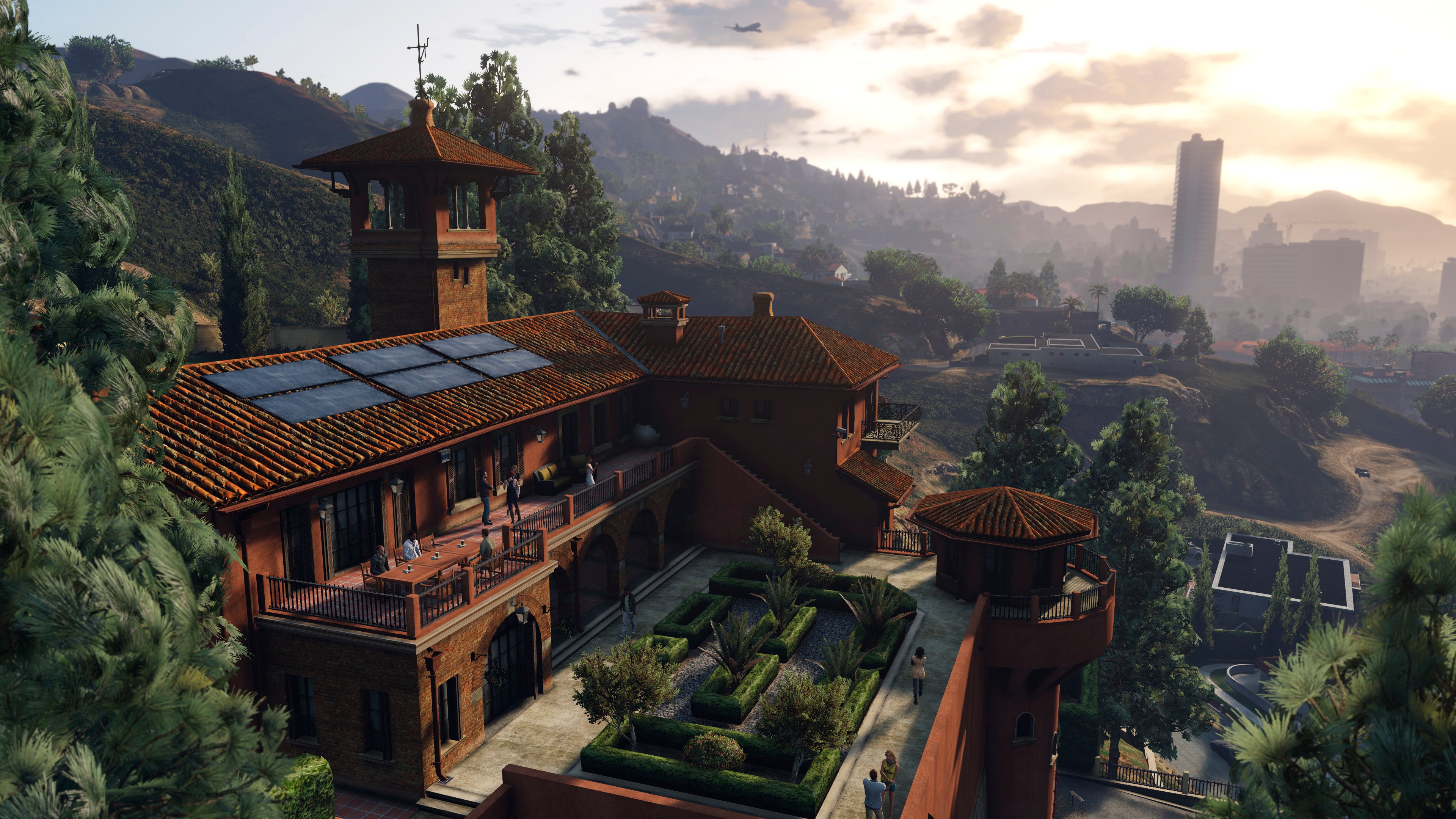 Michael De Santa standing outside his Los Santos home in GTA 5.