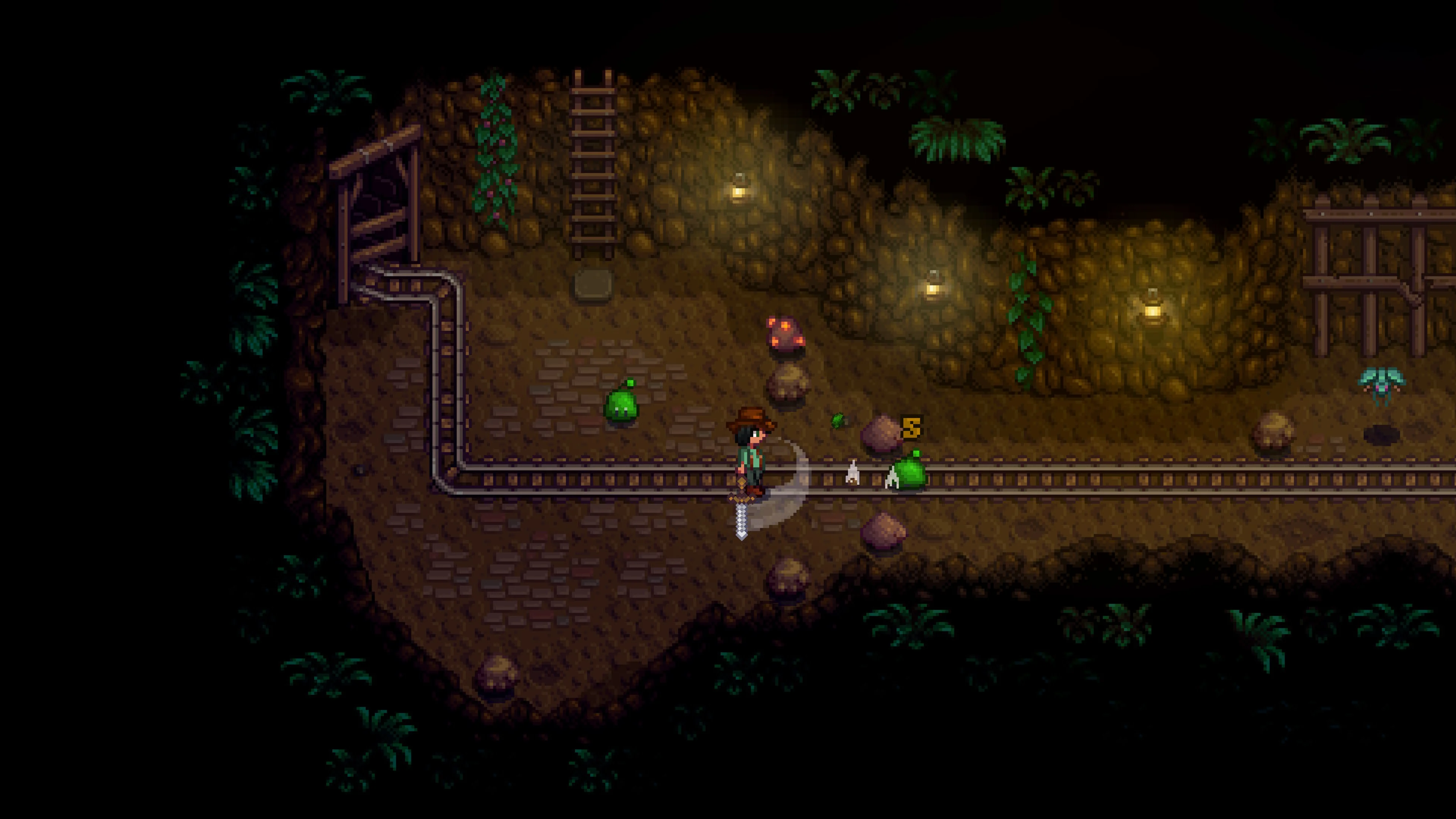 A farmer facing slimes in a dark mine in Stardew Valley.