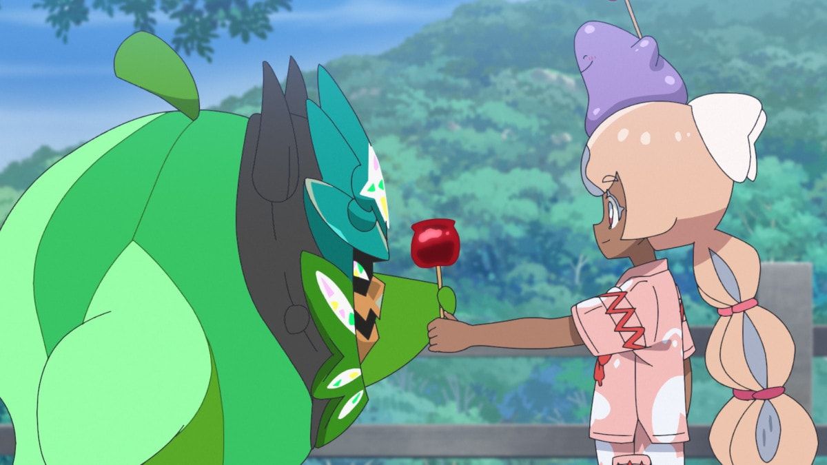 Navi offers a red festival treat to Ogerpon in a clear Pokémon anime still.