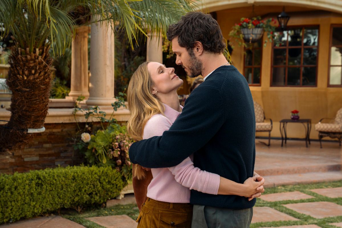 Joanne and Noah hold each other in a garden in Nobody Wants This Season 3.