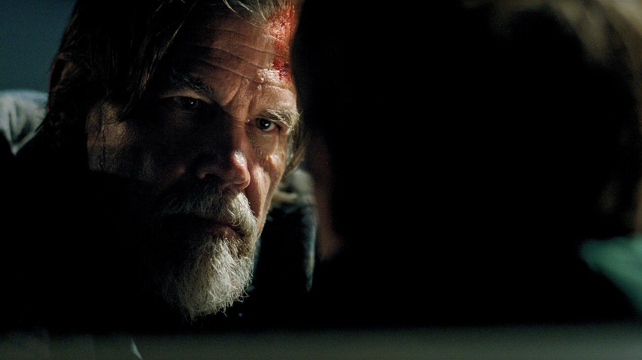Josh Brolin appears in a close-up from Whalefall.