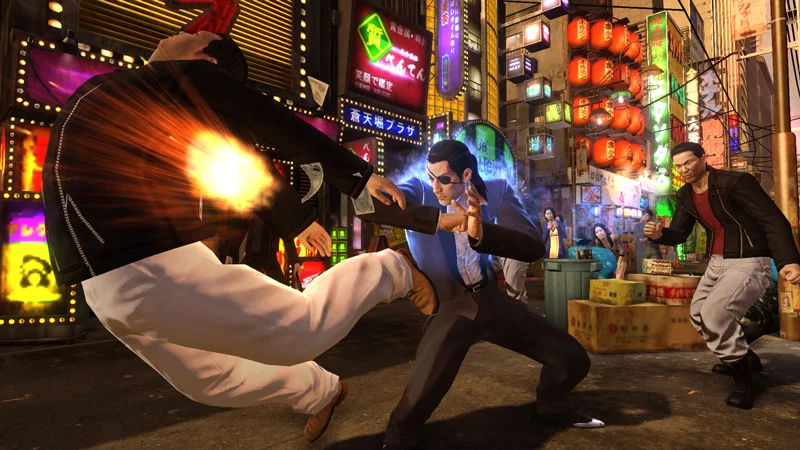 Official SEGA Yakuza 0 gameplay screenshot of Majima in a dark suit attacking a nearby opponent in Thug style.