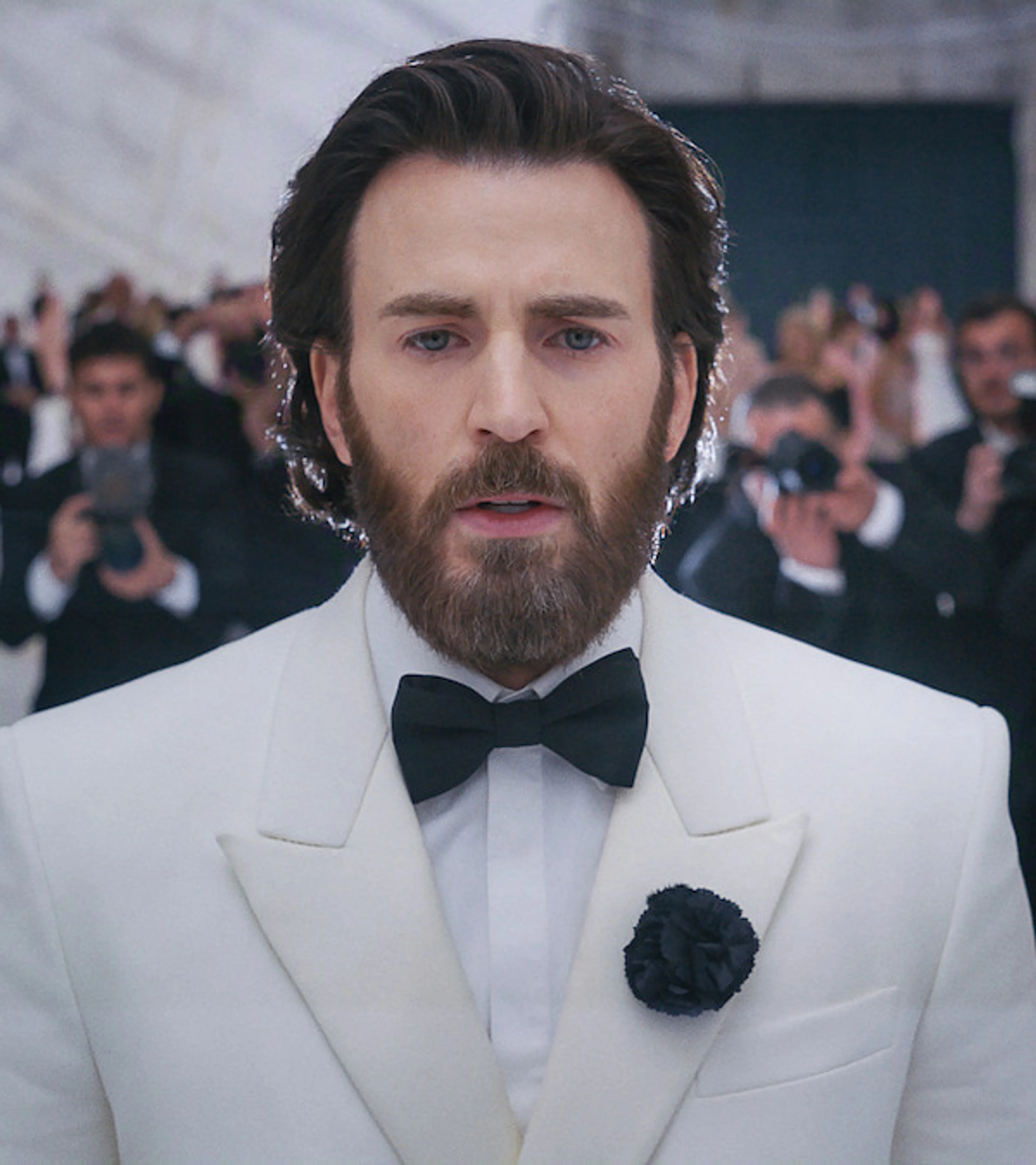 Chris Evans as Mike Tyler attends a glamorous gala in Sacrifice.