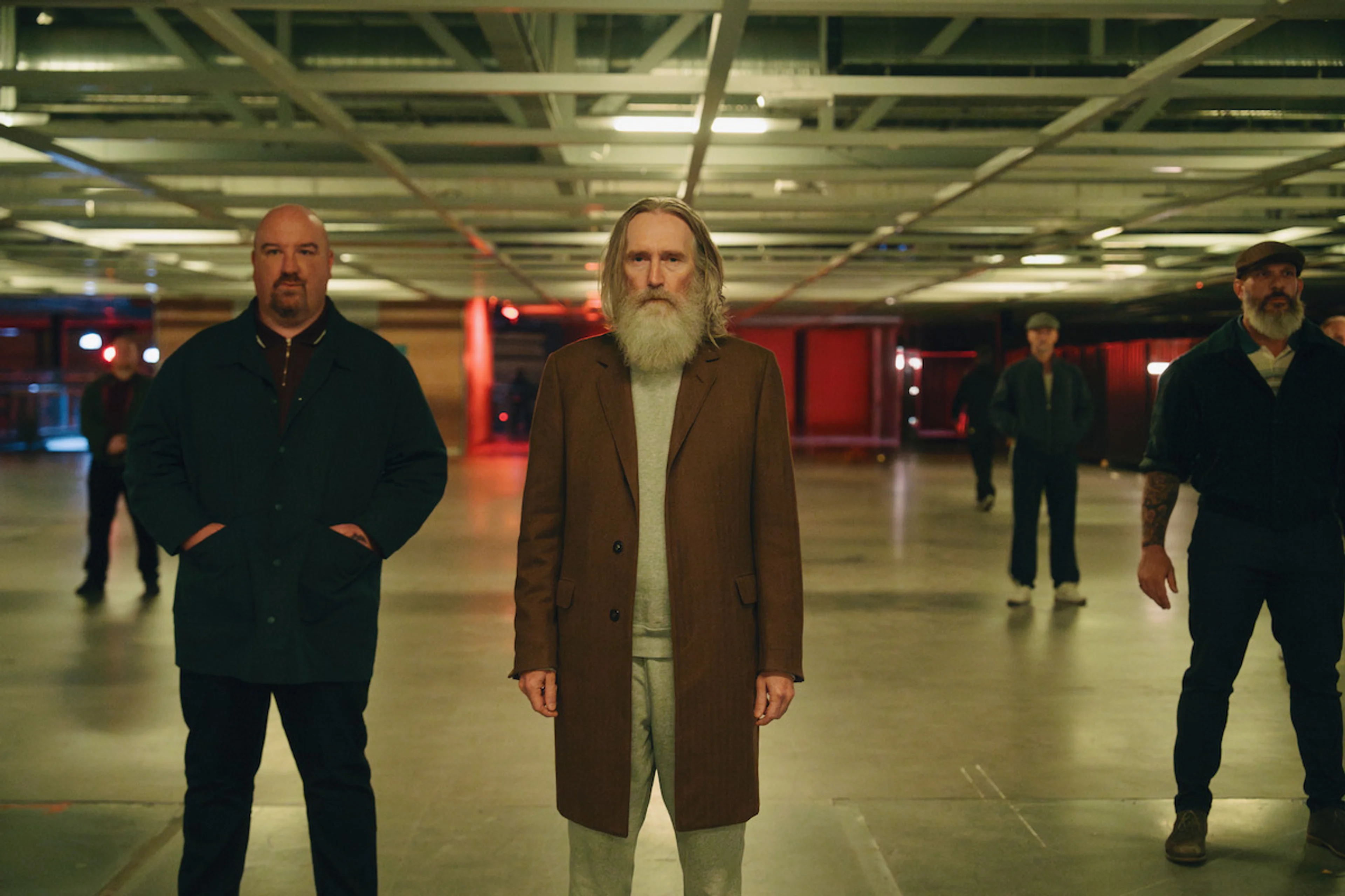 Gospel John stands with his followers in a parking garage during The Gentlemen Season 2 finale.