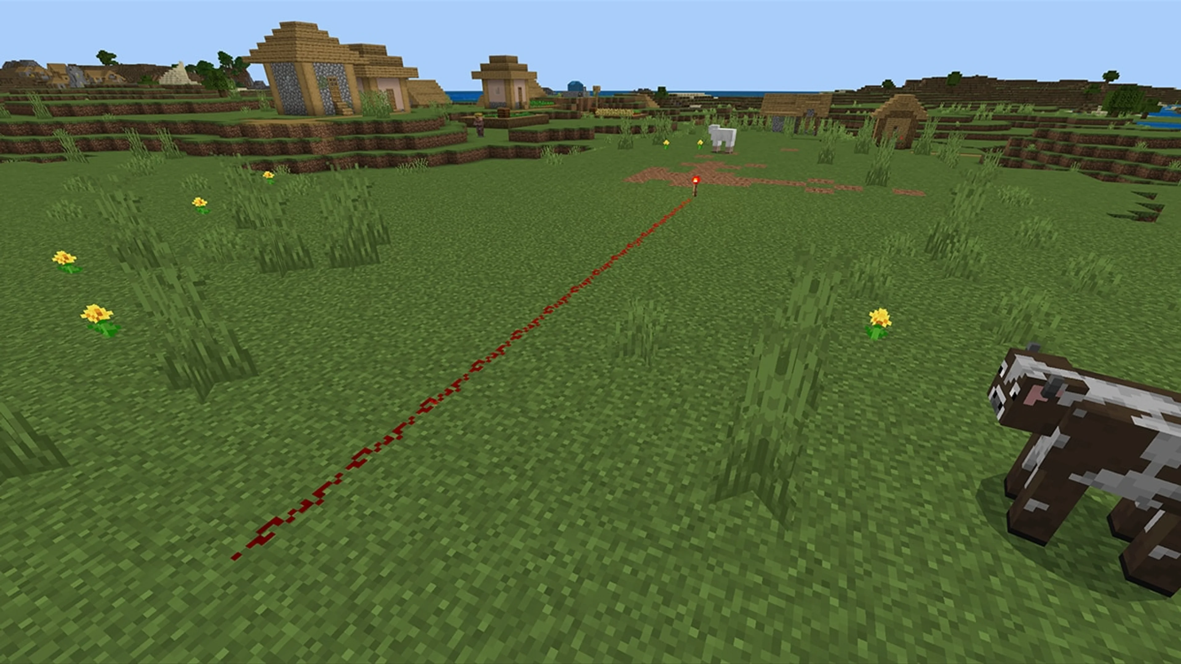 An official Minecraft demonstration of redstone dust becoming darker as a signal travels away from a torch.
