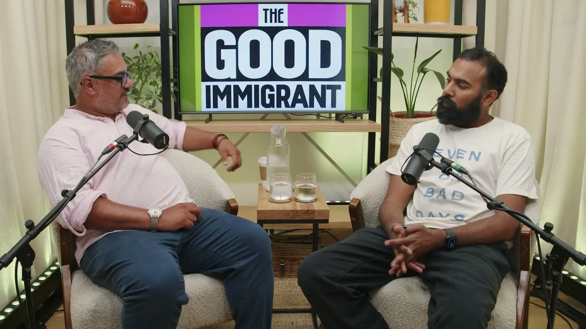 Himesh Patel and Nikesh Shukla sit opposite each other during a conversation.