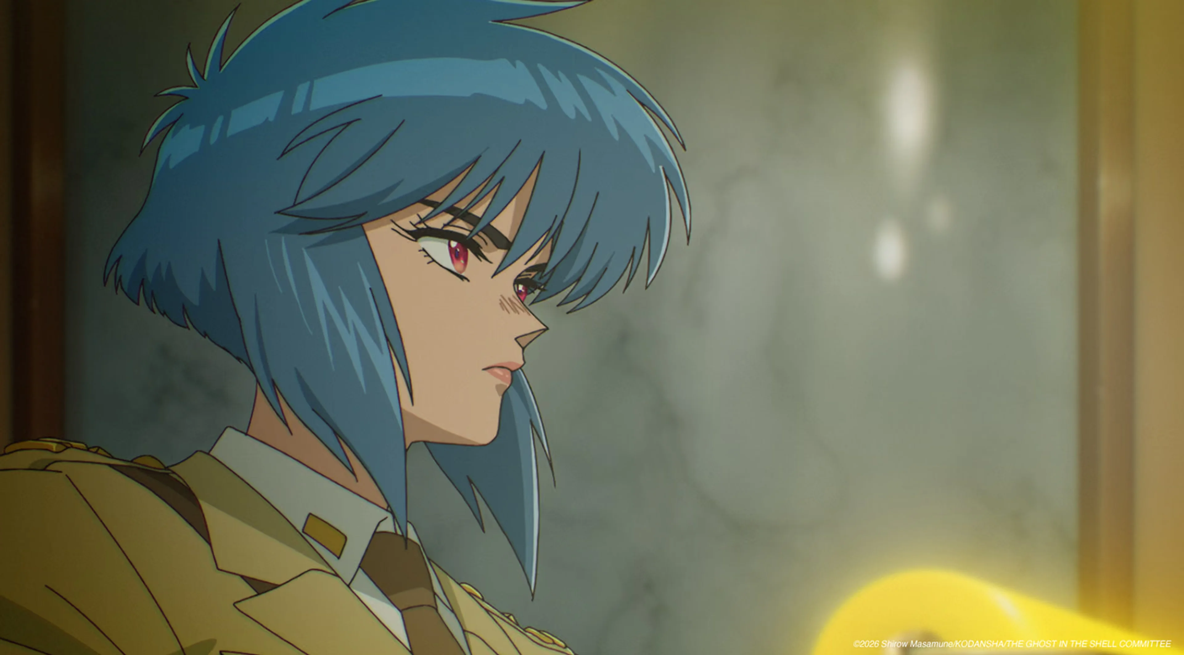 Motoko Kusanagi looks toward the camera in an official scene cut from The Ghost in the Shell Episode 9.